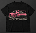 Pink track-inspired coupe with oversized rear wing — front design