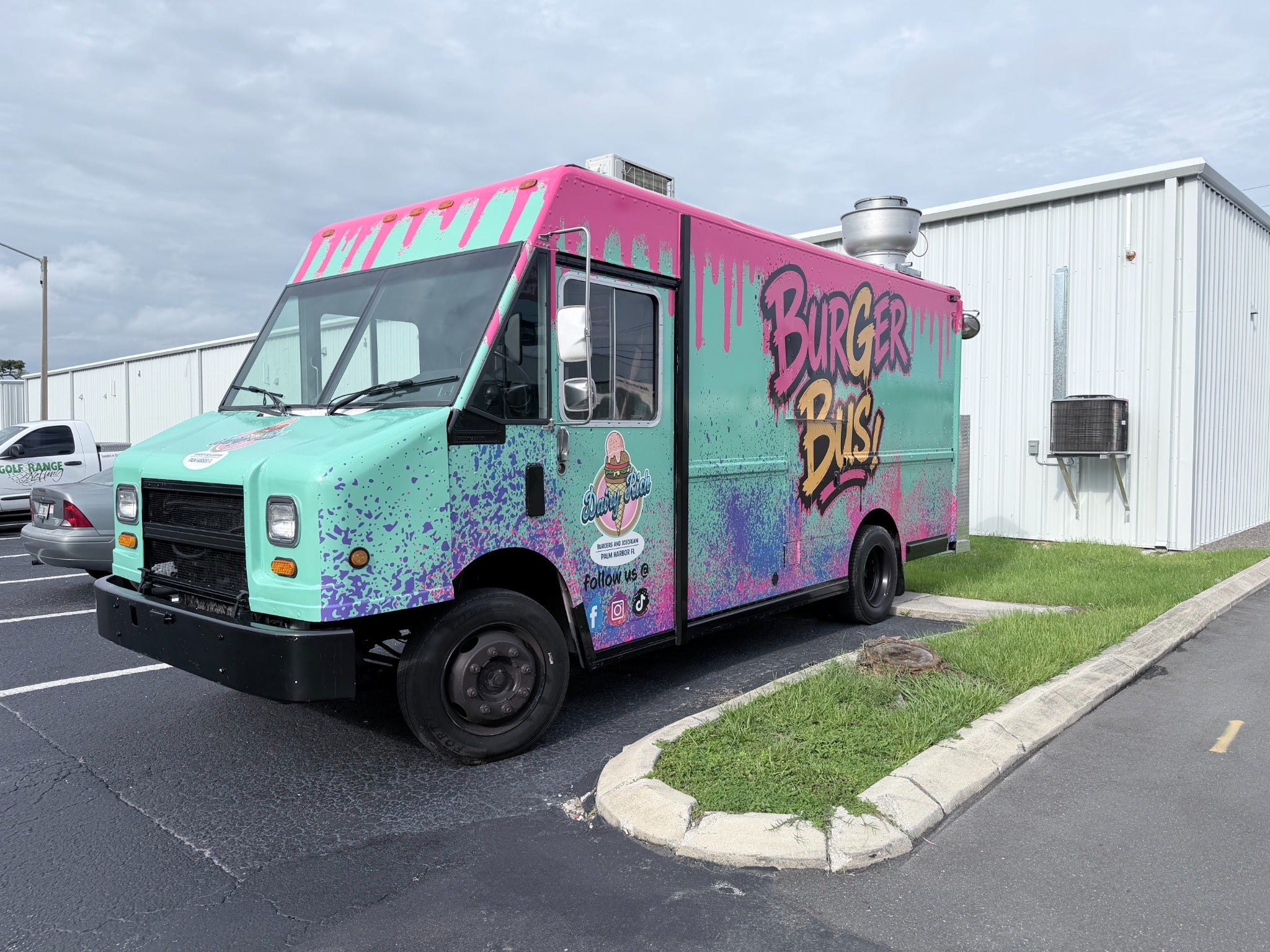 Burger Bus food truck with colorful custom vehicle graphics