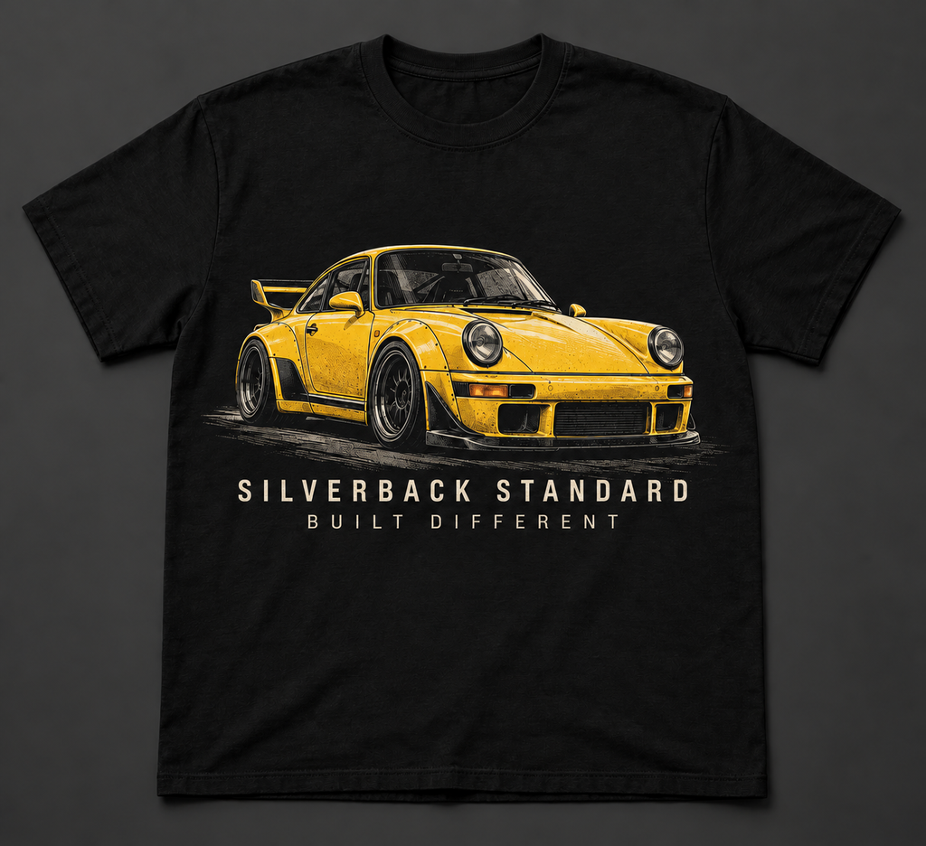 Yellow classic widebody coupe — front design