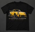 Yellow classic widebody coupe — front design